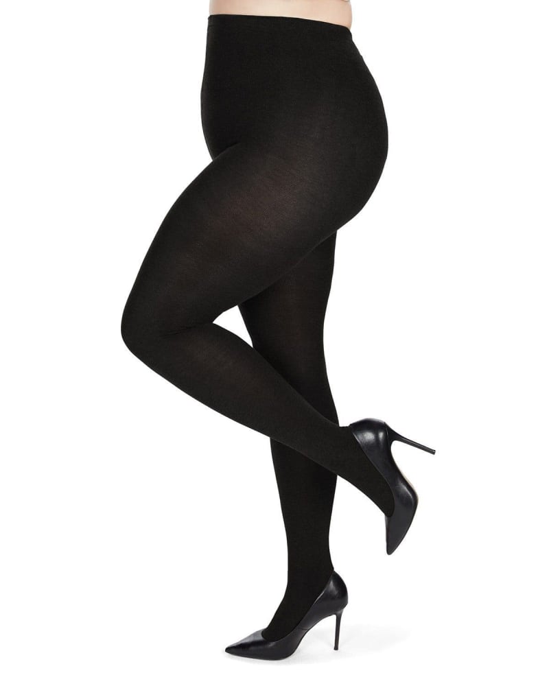 Side of a model wearing a size E Women's Queen Size Extra Wide Basic Nylon Ribbed Tights in Black by Memoi. | dia_product_style_image_id:299892